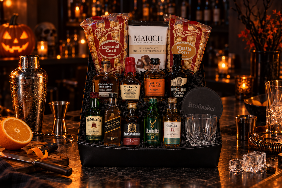 Dark home bar with a cocktail shaker and cut orange for Halloween cocktails