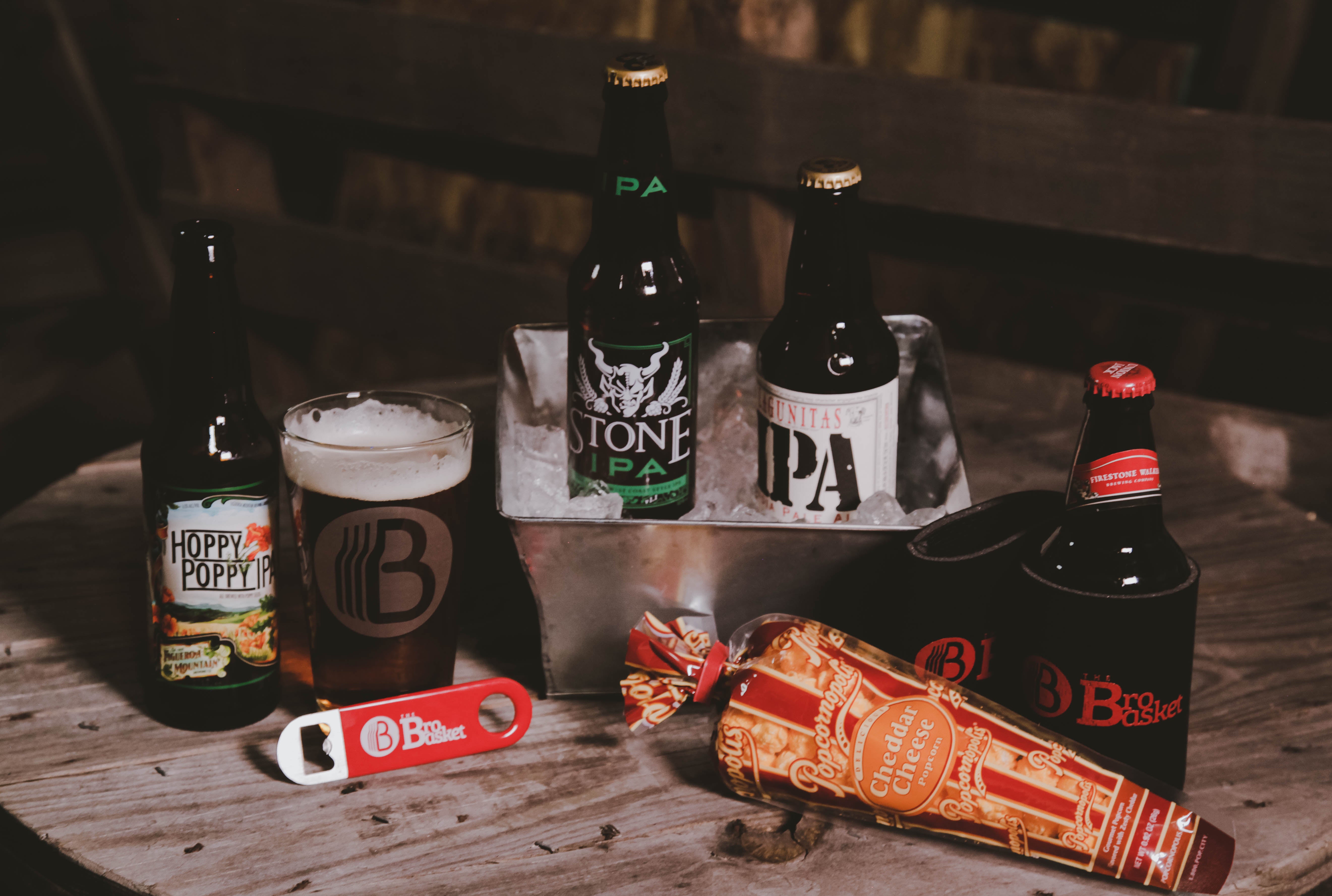 IPA beer gift basket with bottles, glass, and snacks perfect for men who love craft beer.